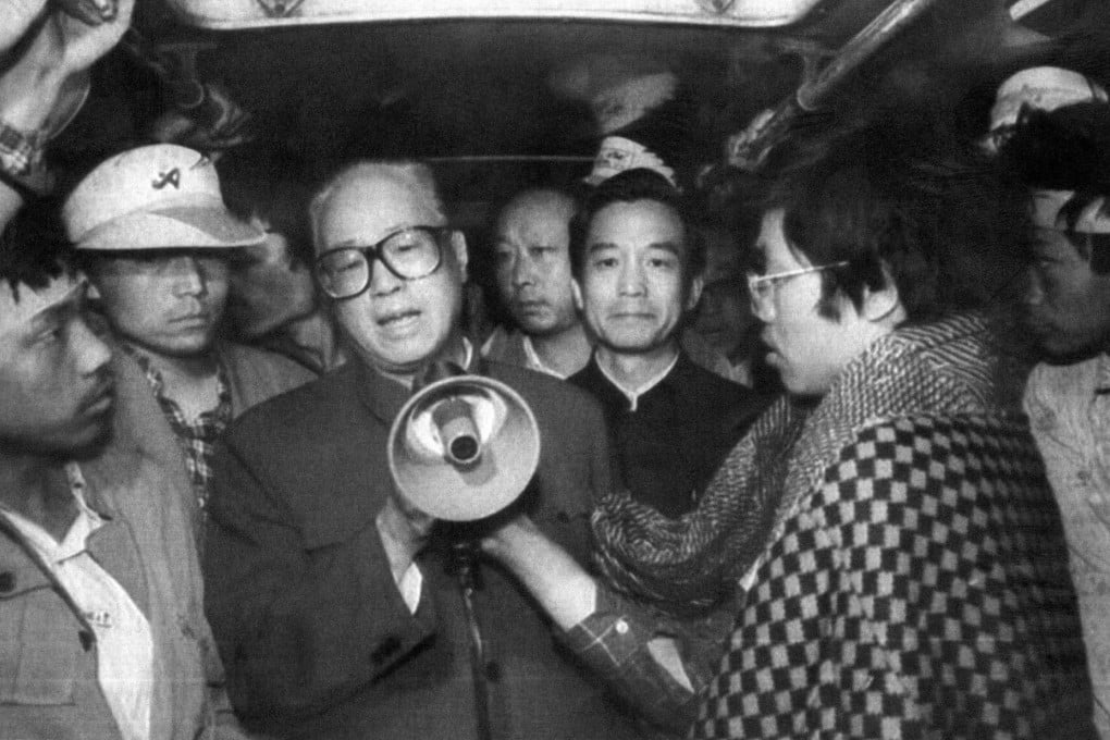 Zhao Ziyang, then the Communist Party chief, addresses student hunger strikers with a loud-hailer in Tiananmen Square at dawn on May 19, 1989, inside a bus where they were sheltering. He tearfully told them: "We have come too late." Photo: AFP