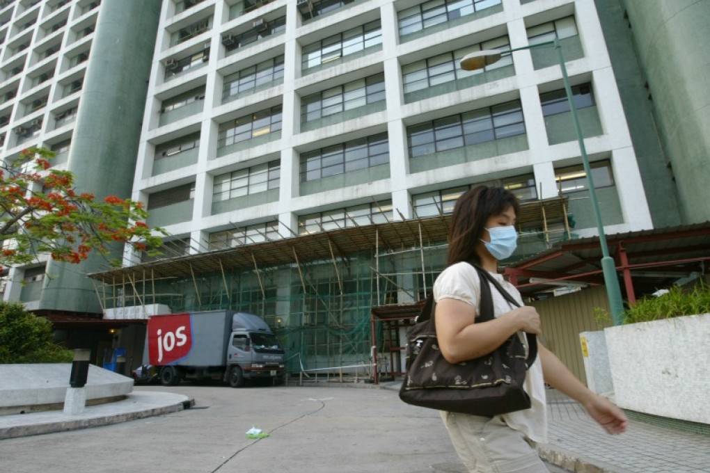 The man found in the flat was taken to Caritas Medical Centre in Cheung Sha Wan. Photo: Robert Ng