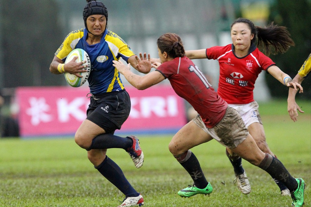 Hong Kong players gang up on Amina Baratova of Kazakhstan. Photo: Edward Wong/SCMP