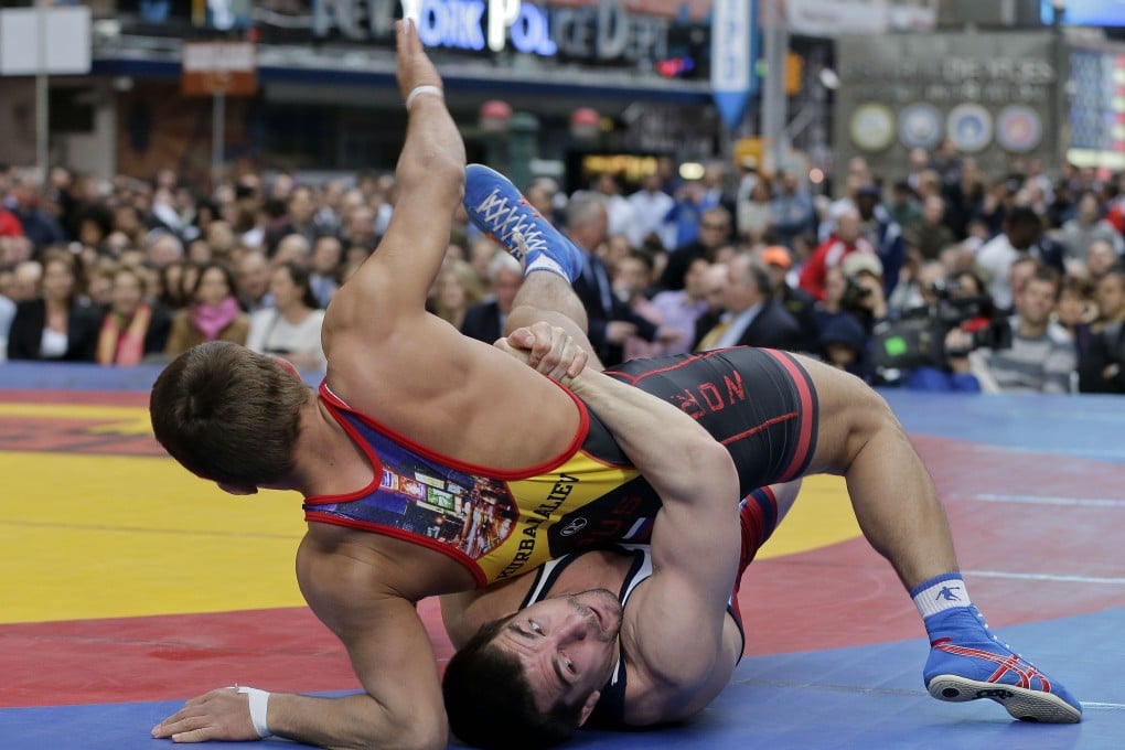 North Korea hopes it is on a roll by announcing it will be joining  the world of championship wrestling. Photo: AP