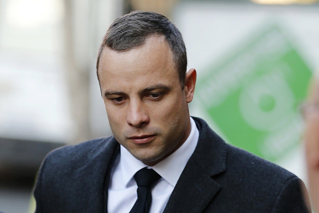 Olympic and Paralympic track star Oscar Pistorius arrives at the  High Court in Pretoria ahead of his trial for the murder of his girlfriend Reeva Steenkamp. Photo: Reuters