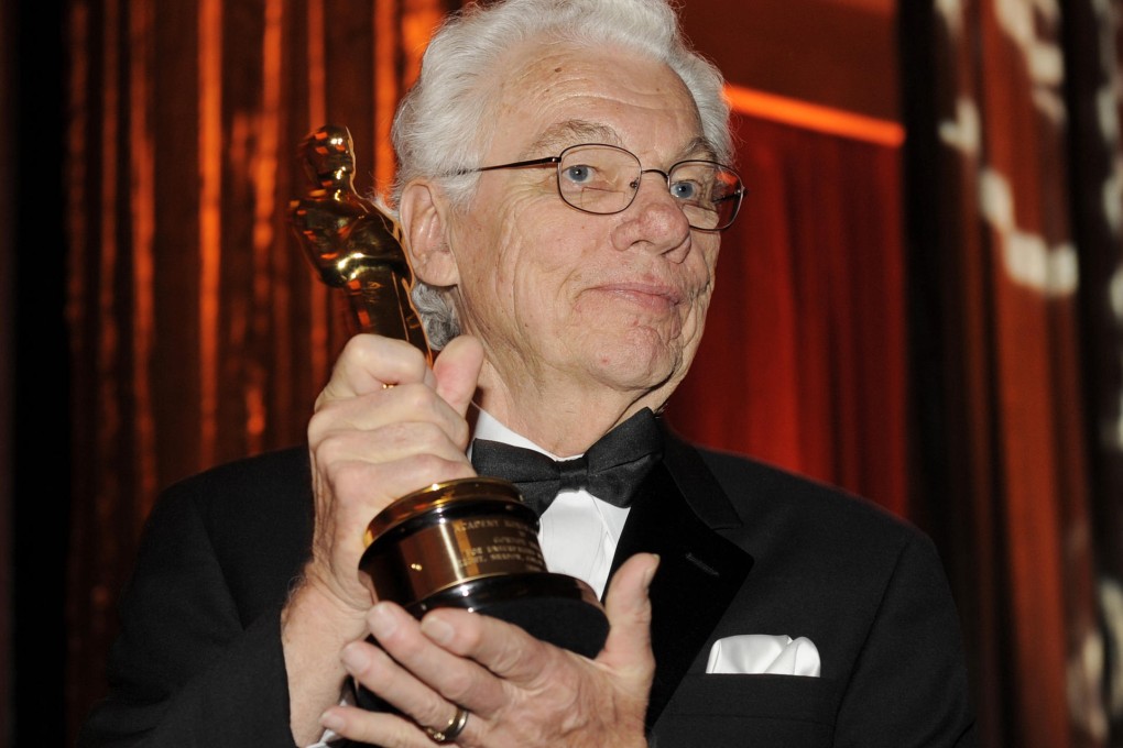 Gordon Willis poses with his honorary Oscar. Photo: AP