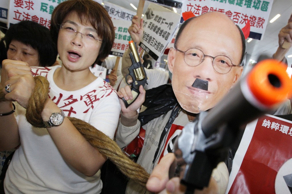 Protesters oppose the building of incinerator and expansion of landfill in Tseung Kwan O outside the Legco Building in Tamar on May 7. Photo: Dickson Lee