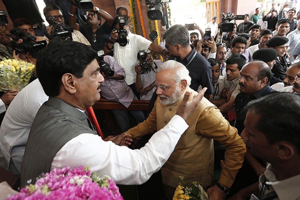 Hindu nationalist Narendra Modi arrives to attend the BJP parliamentary party meeting in New Delhi. Photo: Reuters