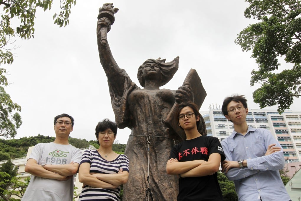 Chong Yiu-kwong (left), Lam Yik-tsz, Tommy Cheung and Victor Wong with the 'Goddess of Democracy' at Chinese University in Sha Tin. Photo: Edward Wong