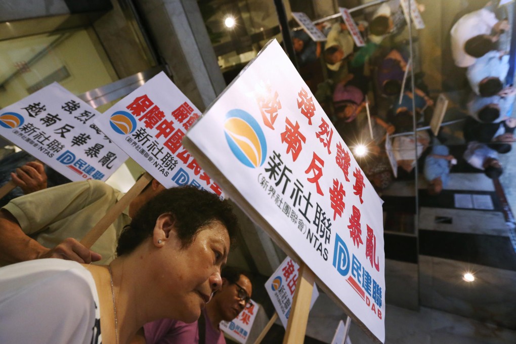 New Territories Association of Societies members protest at the Vietnamese consulate seeking protection for businesses. Photo: Nora Tam