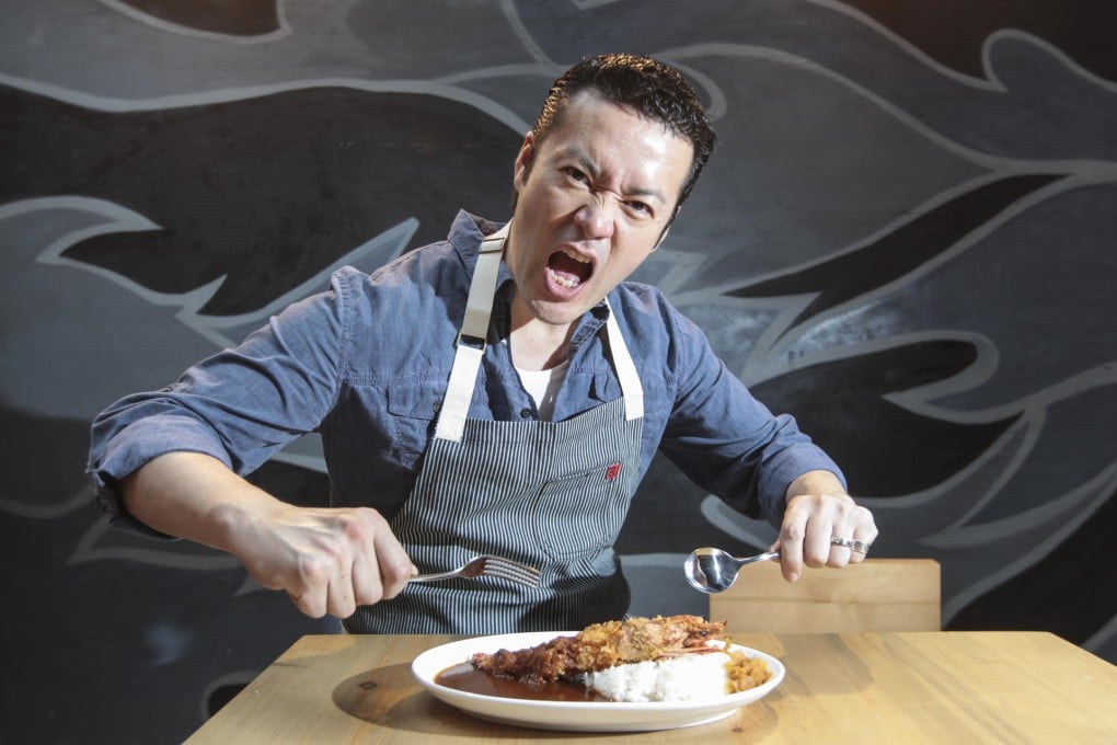 Satoru Mukogawa, head chef at Tiger Curry, with a plate of deep-fried jumbo prawn curry rice.