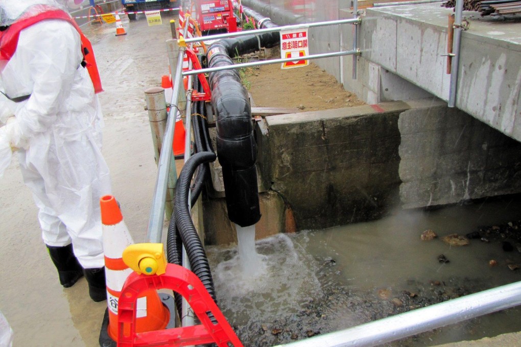 With 300 to 400 tonnes of groundwater becoming contaminated each day, TEPCO seeks to divert its flow to tanks. Photo: EPA