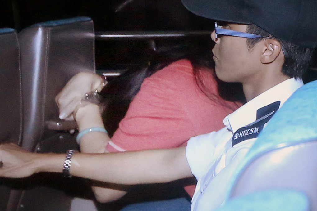 Catherine Au is driven off to prison last year after being convicted of abusing her maid. Photo: Sam Tsang