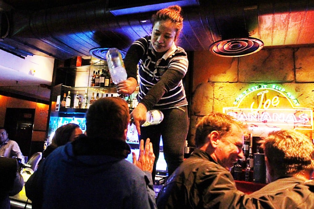 Customers cheer at Joe Bananas on closing night last February. Photo: Sam Tsang