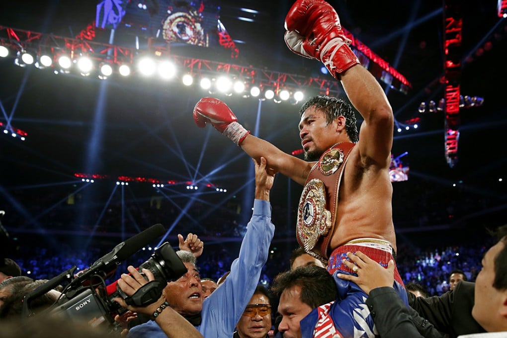 Manny Pacquiao celebrates after defeating Brandon Rios in Macau, the first world-class boxing match in the SAR. Photo: AP