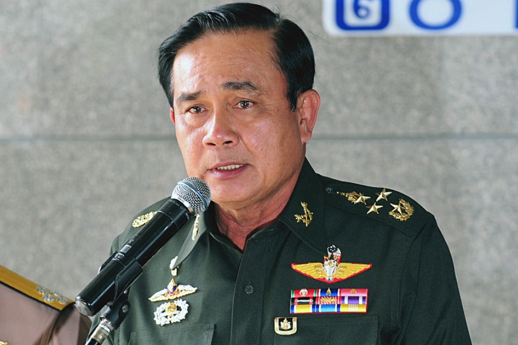 Thai Army Chief Prayuth Chan-ocha addresses the media at the Army Club in Bangkok after declaring martial law. Photo: Xinhua
