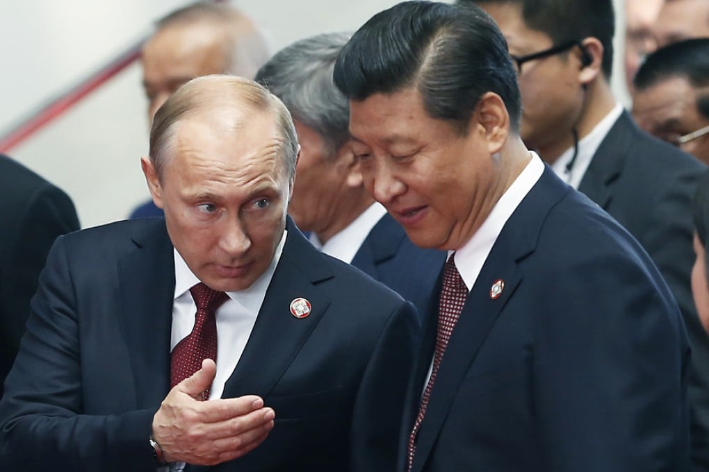 Russian President Vladimir Putin and President Xi Jinping before the meeting today. Photo: EPA Photo: AFP