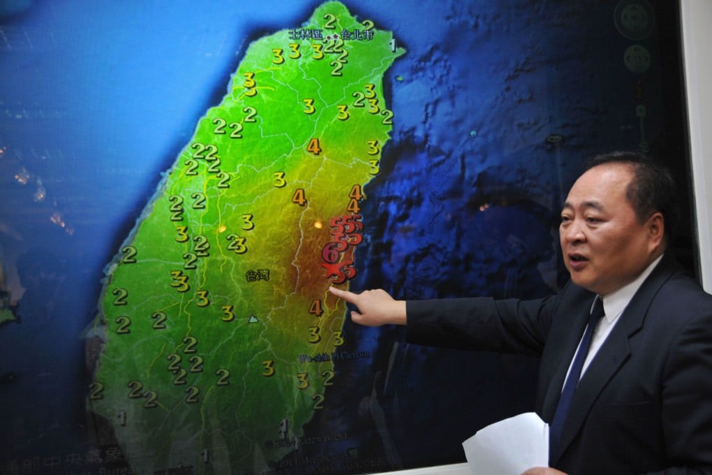 Kuo Kai-wen, director of Taiwan's seismology centre, points to where the earthquake hit. Photo: AFP