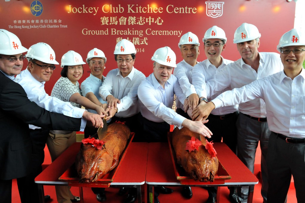 Soccer and racing executives come together at a ground-breaking ceremony for the Jockey Club Kitchee Centre yesterday. Photo: Xinhua