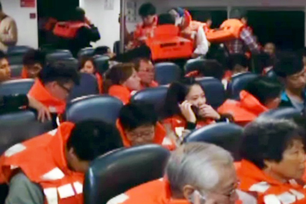 Passengers wear life vests on the ferry. Photo: SCMP Pictures