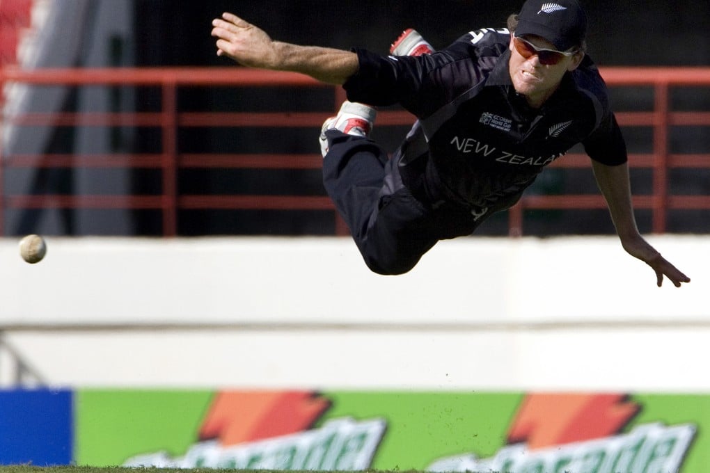 Lou Vincent dives as he throws the ball during New Zealand's  World Cup cricket match against Canada in Gros Islet in 2007. Photo: Reuters
