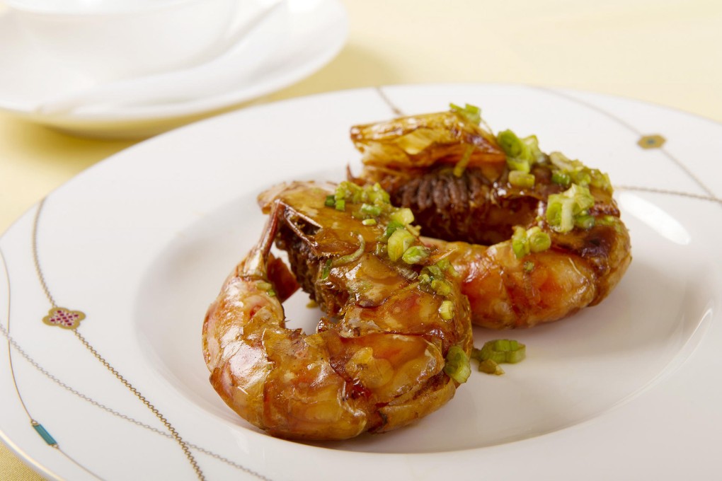 Pan-fried king prawns with soy sauce at Fook Lam Moon.