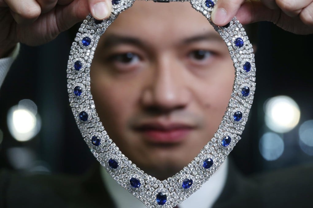 Stewart Young of Tiancheng with a Burmese sapphire and diamond necklace. Photo: K.Y. Cheng