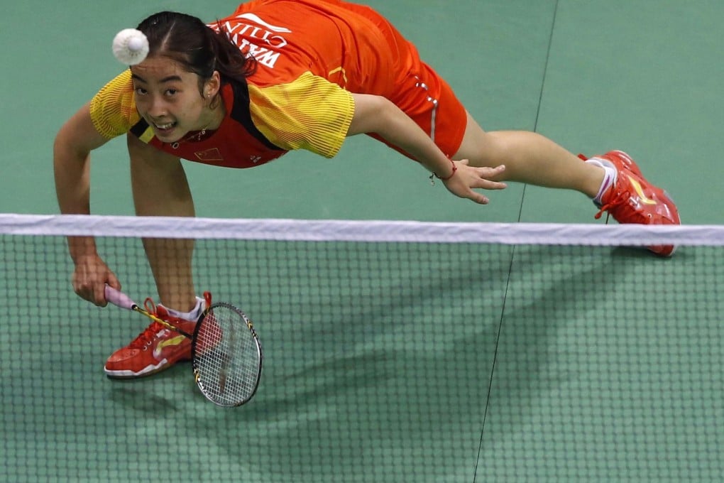 China's Wang Shixian fires a return back to South Korea's Bae Yeon-ju in their singles semi-final of the Uber Cup in New Delhi.