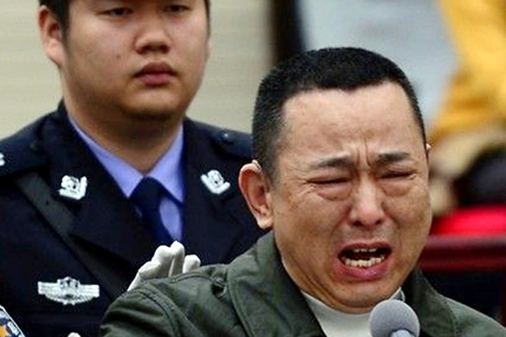 Sichuan mining tycoon Liu Han burst into tears at court. He has been sentenced to death after being found guilty of charges including murder and illegally selling firearms. Photo: SCMP Pictures
