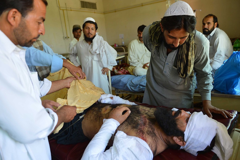 An injured tribesman arrives at a hospital from North Waziristan, following operations by the Pakistan army. Photo: AFP