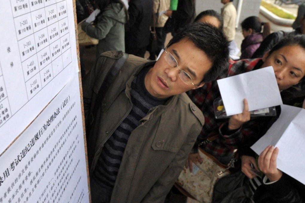 Seating is checked at the national civil service exam. Photo: Xinhua