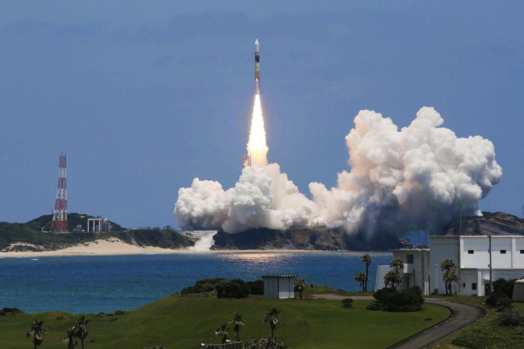 Japan's new mapping satellite successfully launched and carried by H-IIA rocket will be used to survey damage from natural disasters and changes affecting rainforests. Photo: AFP