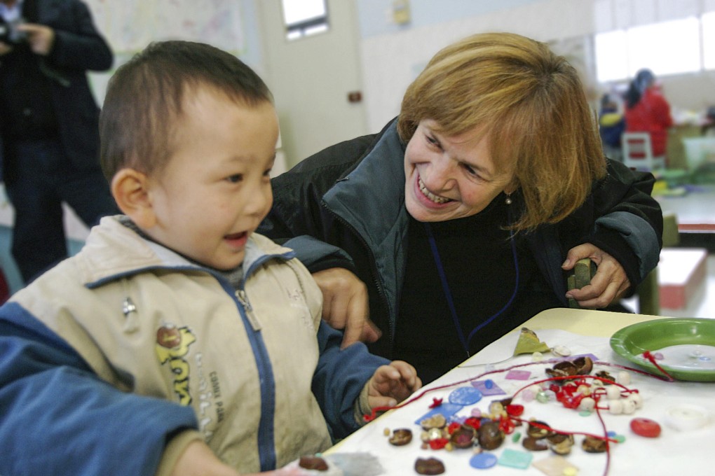 Jenny Bowen with a child at the Little Sisters Preschool in Anhui. Photos: Half the Sky Foundation