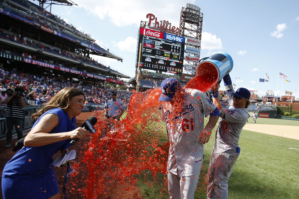 Josh Beckett has a bucket of energy drink thrown over him after his no-hitter. Photo: AP