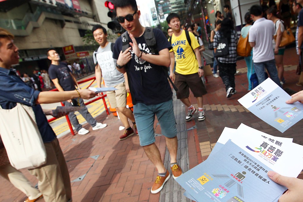 The Civic Party hands out leaflets to the public in Causeway Bay urging them to vote in the June referendum. Photo: Jonathan Wong