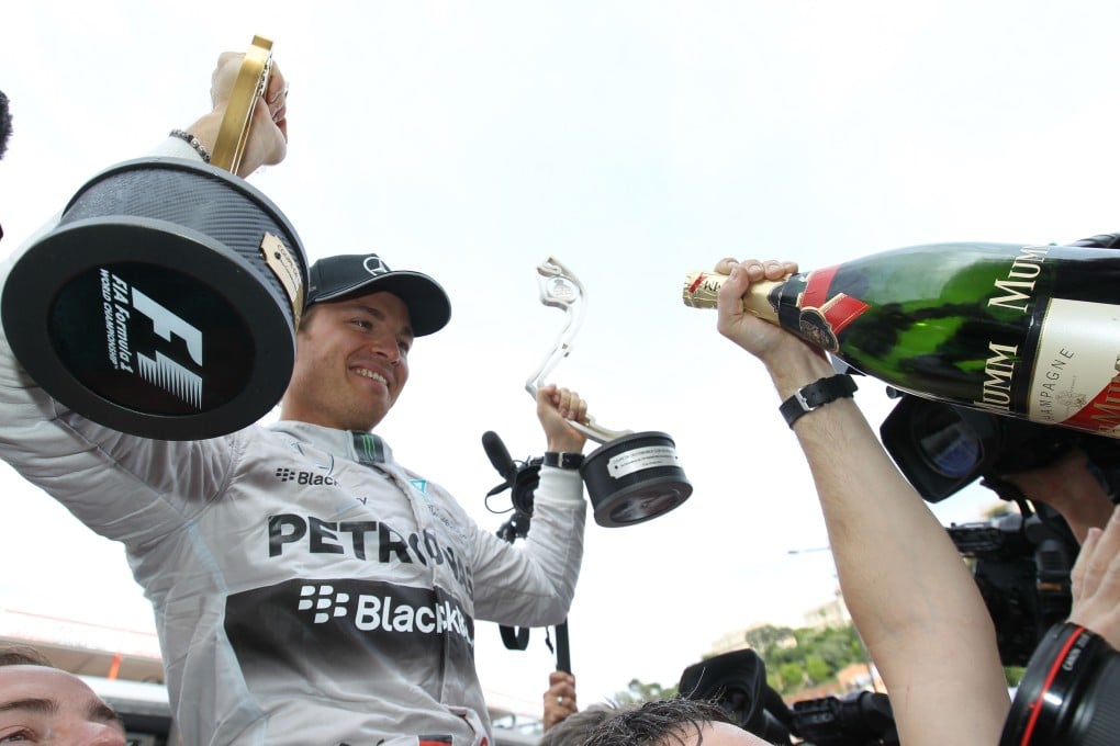 Mercedes' Nico Rosberg celebrates his Monaco Grand Prix victory on the podium on Sunday. Photo: AFP