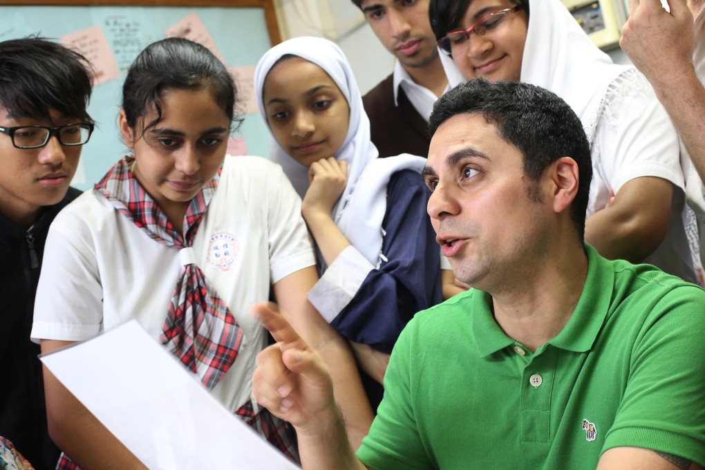 Carlos Soto likes to encourage his pupils at CMA Choi Cheung Kok Secondary School to think differently; he believes problems for ethnic-minority children go beyond their Chinese-language skills. Photo: K.Y. Cheng