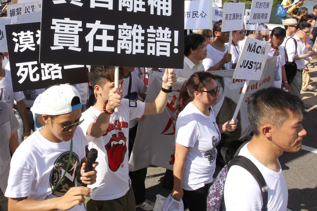 Thousands of demonstrators took to the streets in Macau to protest against retirement packages proposed for ministers. Photo: Dickson Lee