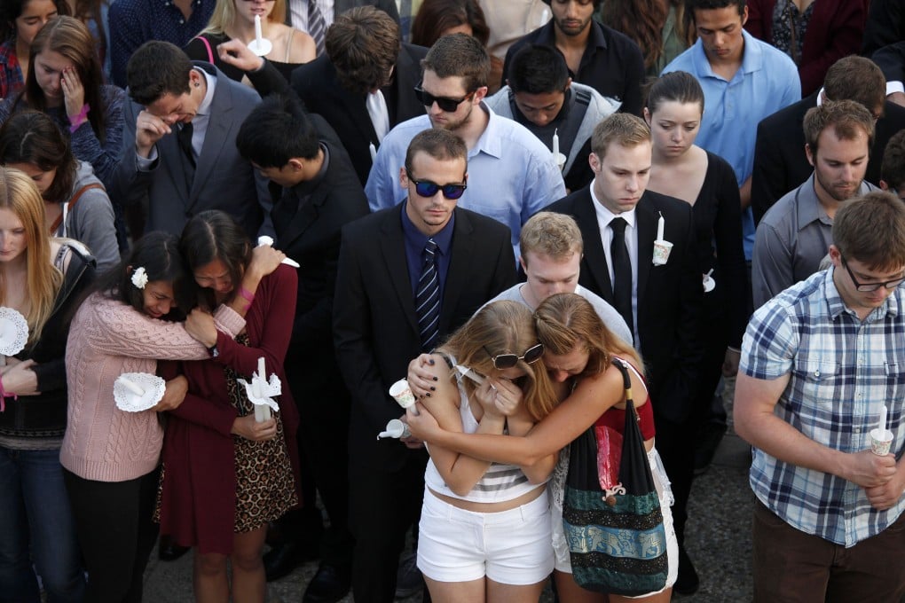 Students gather on the UC Santa Barbara campus for a candlelight vigil for those affected by the tragedy. Photo: AFP