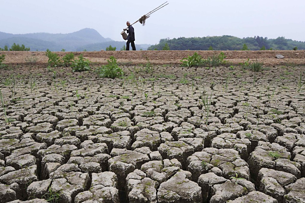 A reservoir designed to power turbines is empty after a sluice gate at Ludila hydropower station was swept away. Photo: Reuters