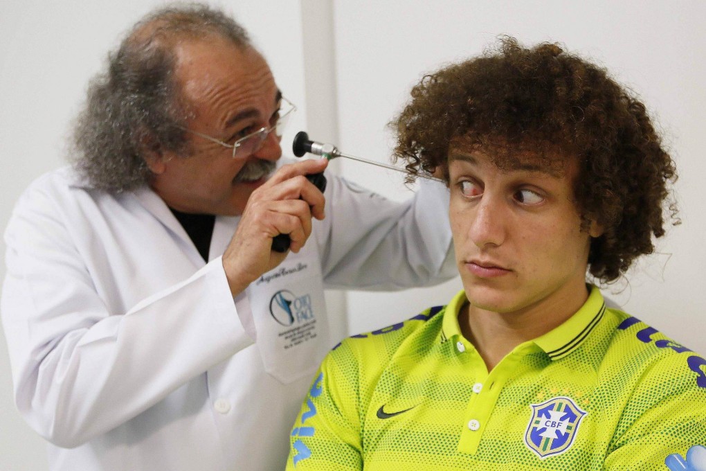 David Luiz undergoes a medical check-up at the squad's base. Luiz and Thiago Silva will team up in defence for Brazil. Photo: AFP