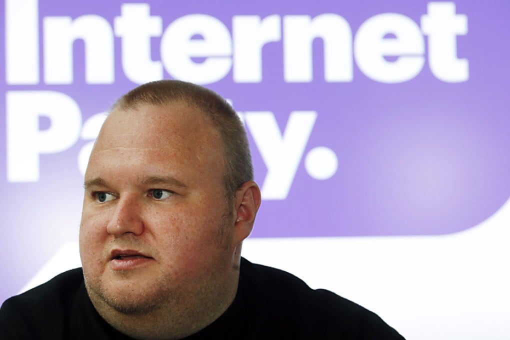 Kim Dotcom talks exclusively to Reuters during his Internet Party pool party at the Dotcom mansion in Coatesville, Auckland. Photo: Reuters