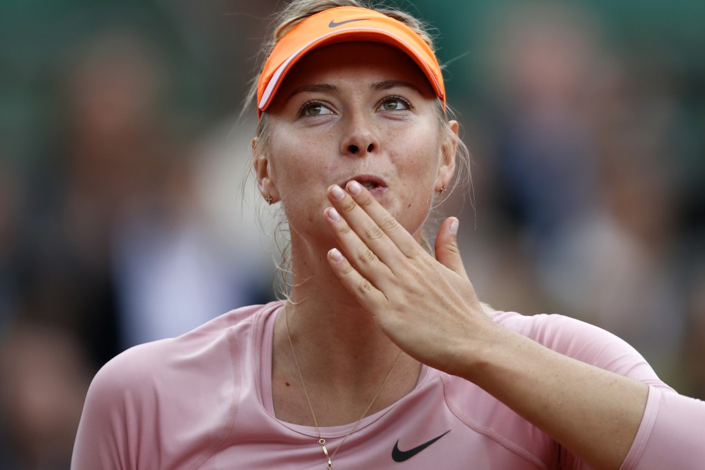 Maria Sharapova of Russia blows kisses to the crowd after beating her compatriot Ksenia Pervak. Photo: Xinhua