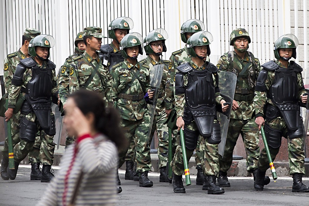 Security has been visibly stepped up in Urumqi, the Xinjiang capital, after the region saw its bloodiest day in five years last Thursday. Photo: AP