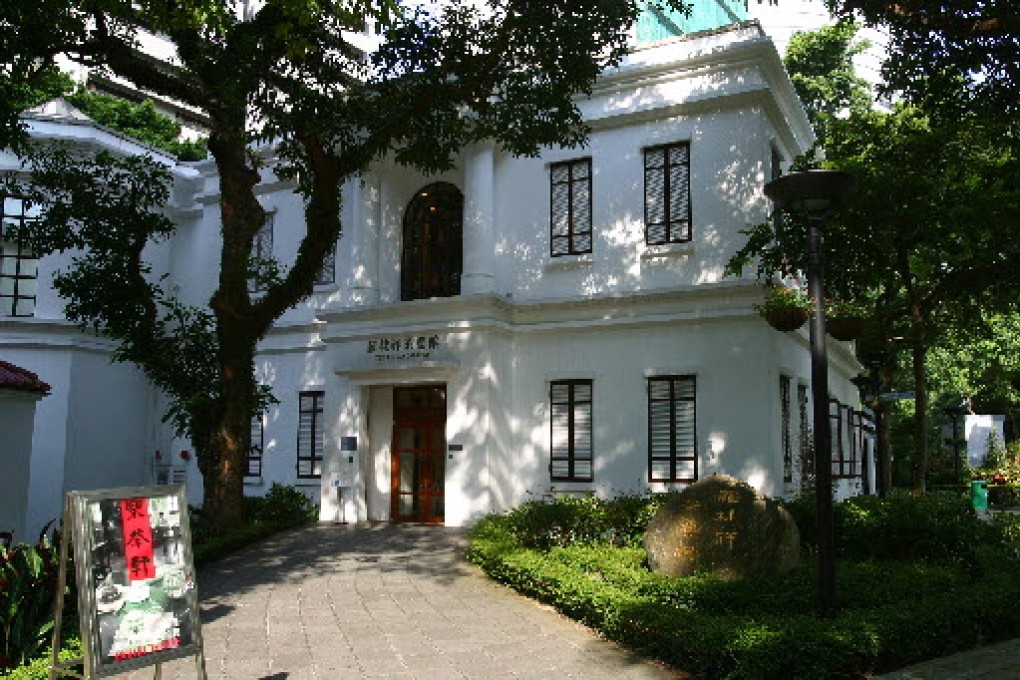 The 155-metre wall forms part of the boundary of Flagstaff House, a colonial monument converted into the Museum of Tea Ware (above). Officials pledged to reassemble the wall later. Photo: David Sutton