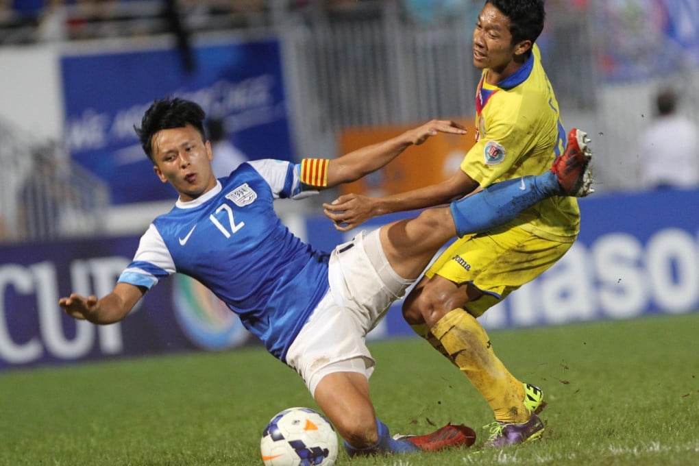 Kitchee's Lo Kwan-yee (left) and Arema Indonesia's Dendi Santoso  during an AFC Cup match at Mong Kok Stadium. Photo: Felix Wong