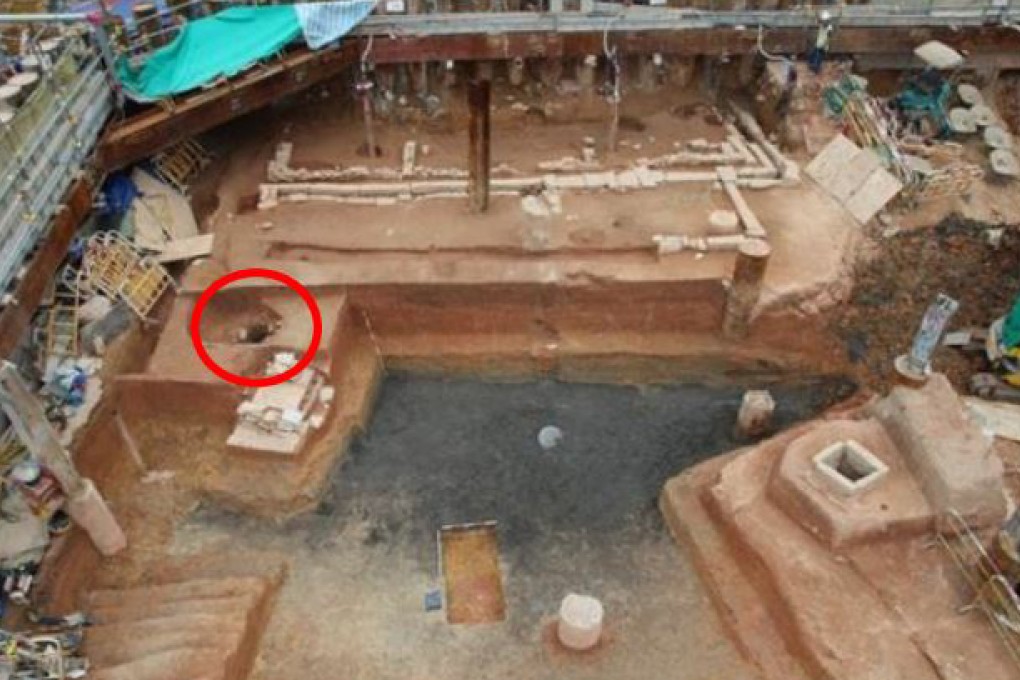 The historic items include a square stone well, two pits which might be wells, a house foundation and open drainage. The item circled in red might be a well. Photo: SCMP