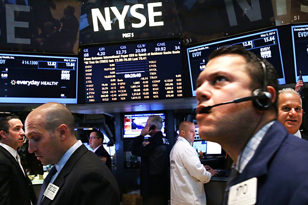 Investors prefer high-yielding shares in a bear market because they tend to have more stable business operations. Photo: AFP