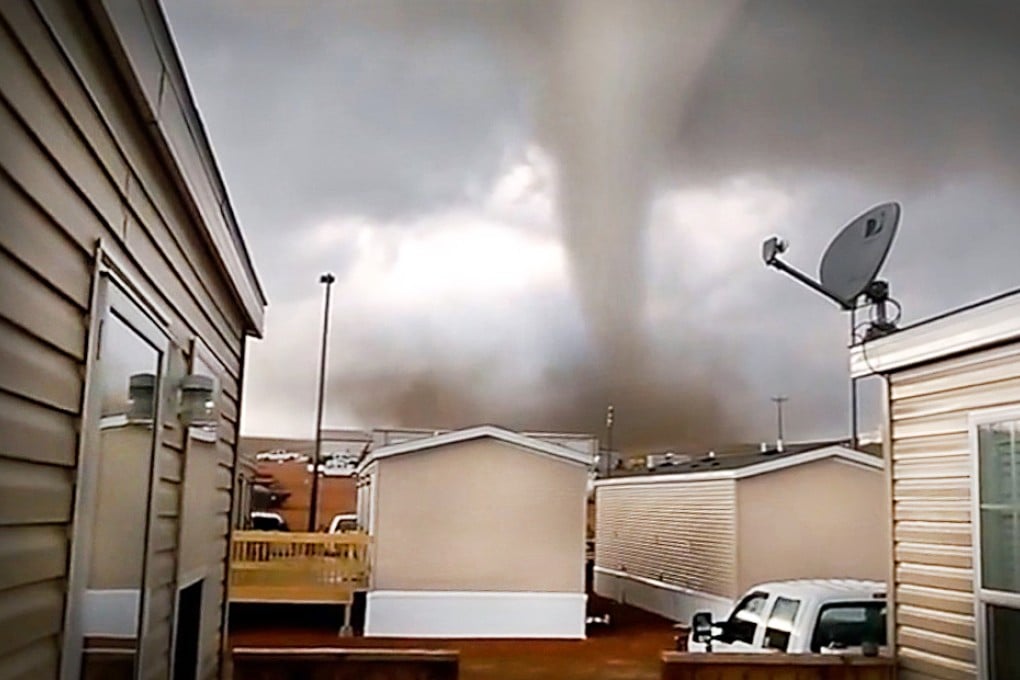 Two American oil workers drove around the side of the tornado and filmed as the storm destroyed a reported 15 trailers and injured nine. Photo: SCMP