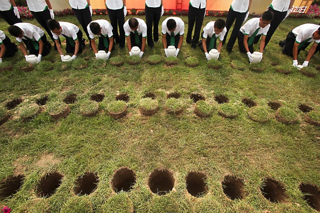 A ceremony using biodegradable urns in Tianjin. The mainland is struggling to shift attitudes about burials. Photo: ImagineChina