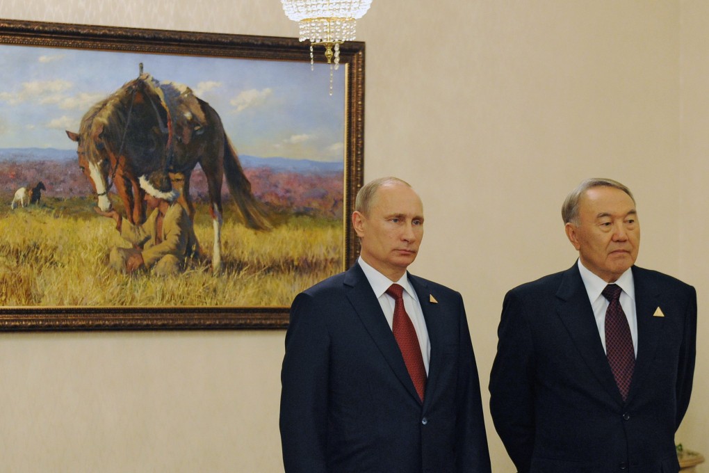 Russian President Vladimir Putin (Left) and Kazakhstan's President Nursultan Nazarbayev .