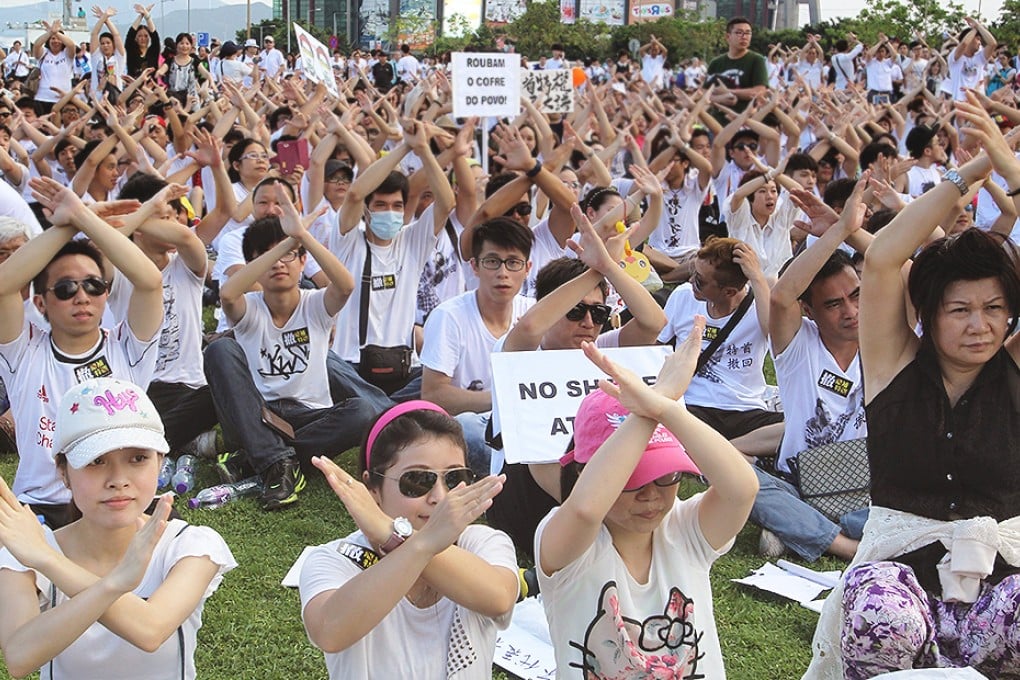 Thousands of protesters took to the streets of Macau for the second day on Tuesday to demand the government scraps the proposed retirement bill. Photo: Dickson Lee