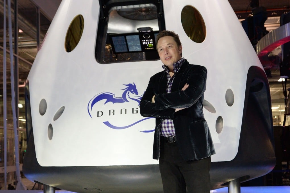 Elon Musk unveils the cone-headed craft dubbed Dragon V2, designed to ferry up to seven astronauts to the International Space Station.