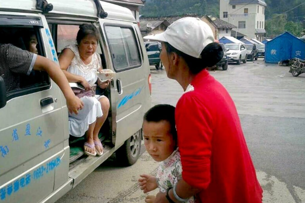 People rushed outdoors after the tremors hit. Photo: Xinhua